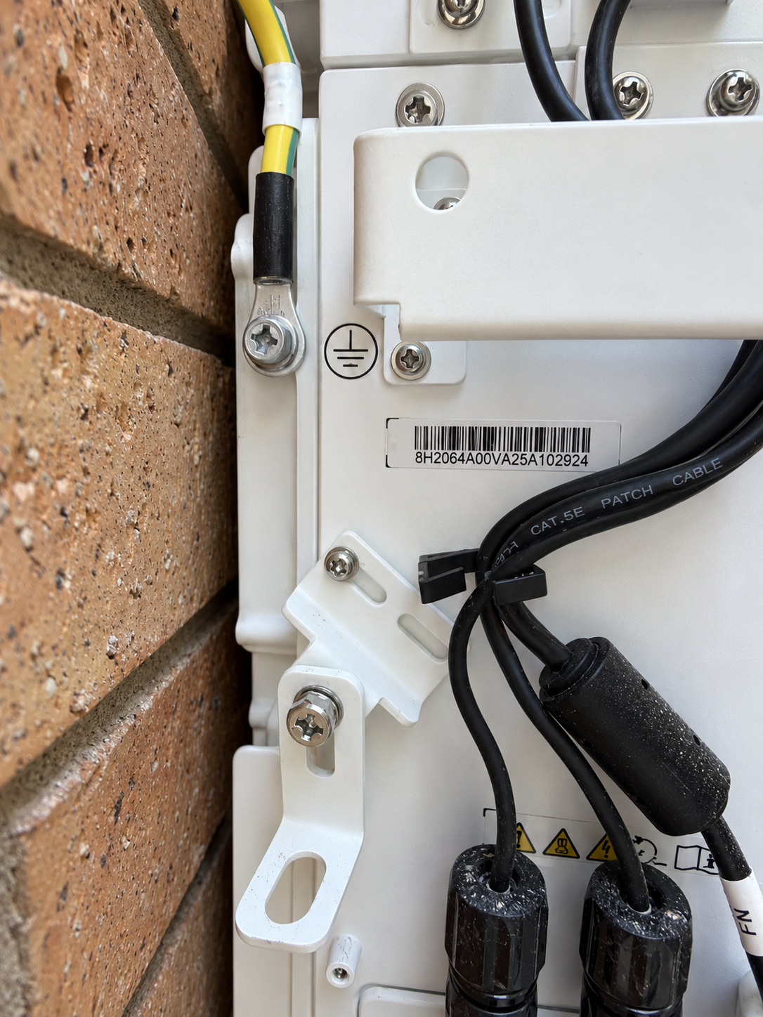 External SOFAR battery cabling, protective-earth connection, screws and wall brackets during installation.